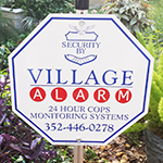 Village Alarm Sign